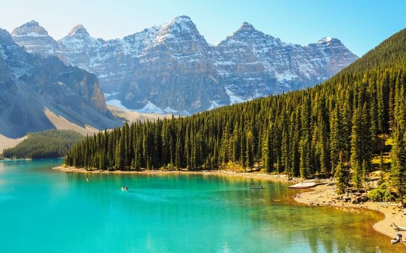 Rocky Mountains reflecting in Lake Moraine, Alberta, Canada.